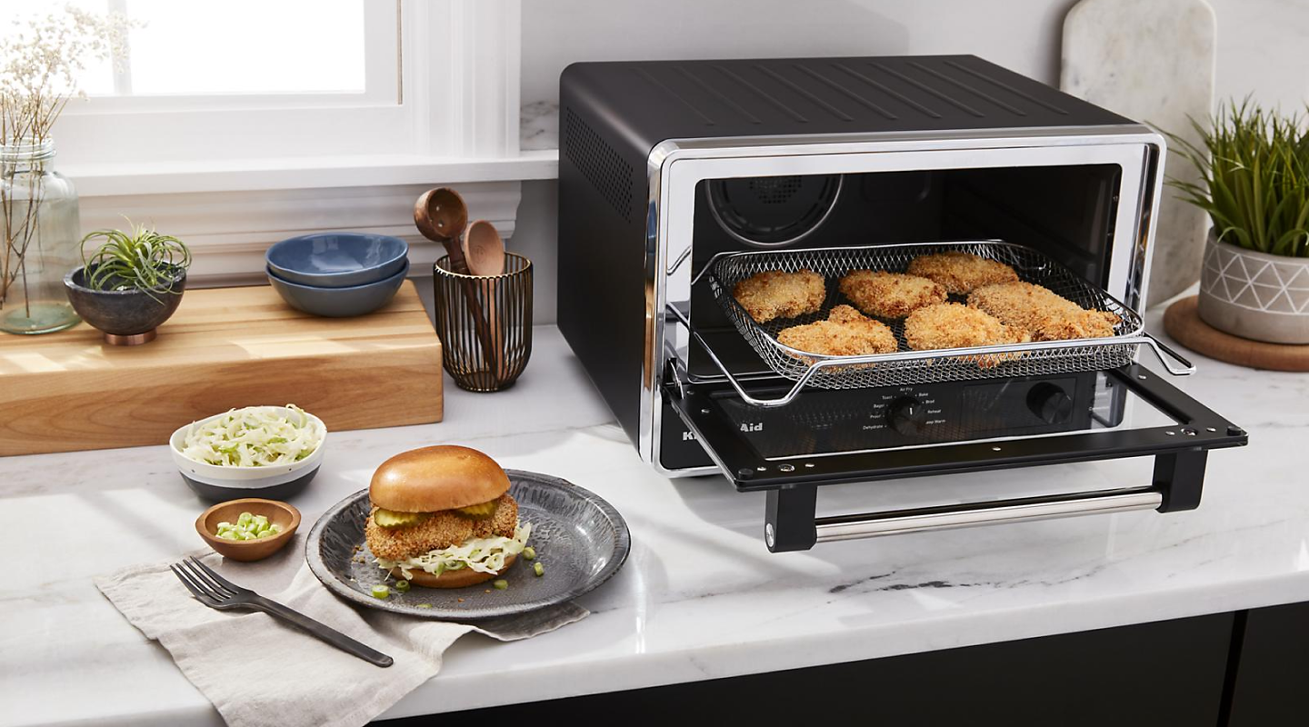 Breaded chicken inside a toaster oven
