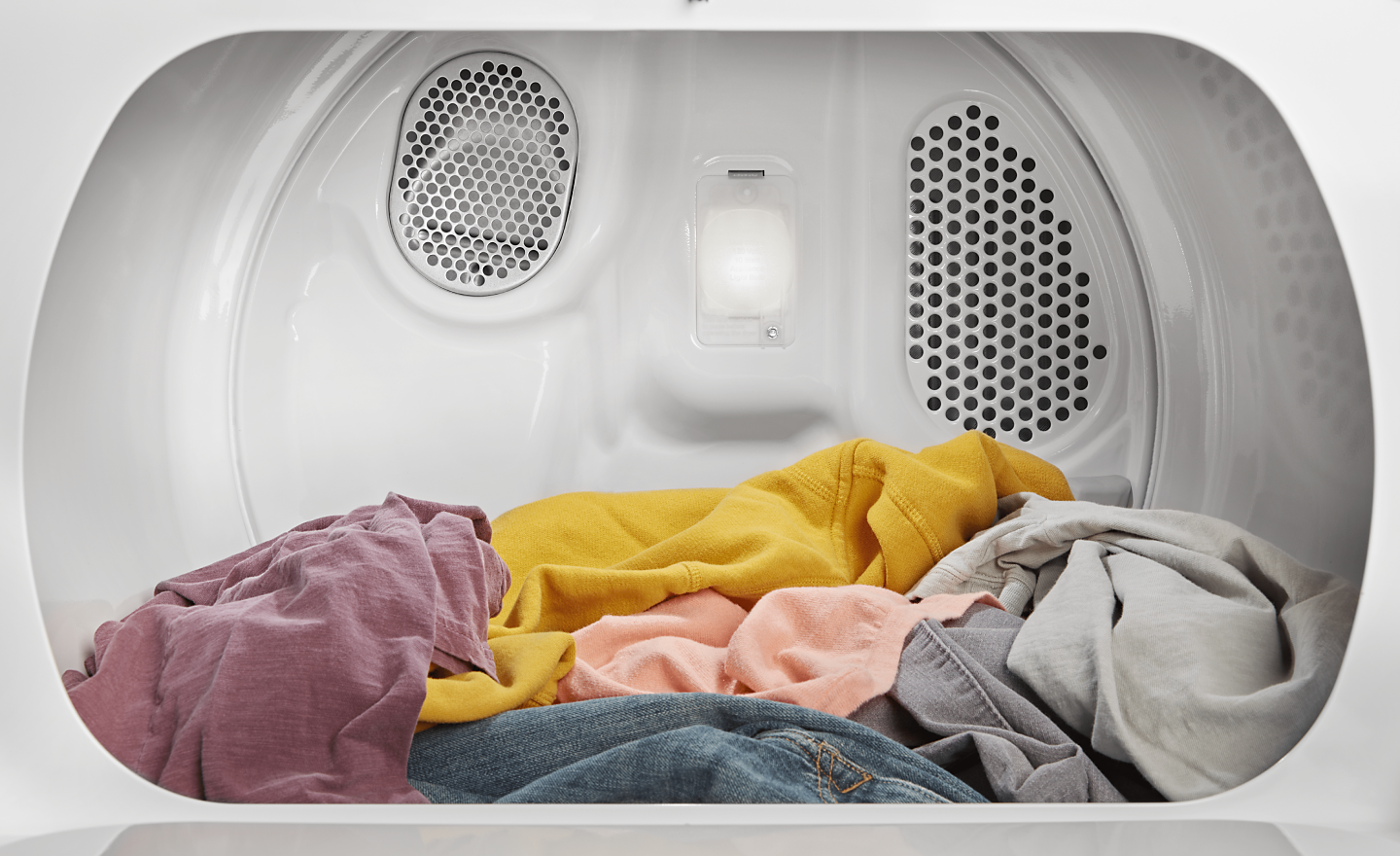 A load of laundry in a Whirlpool® Dryer.