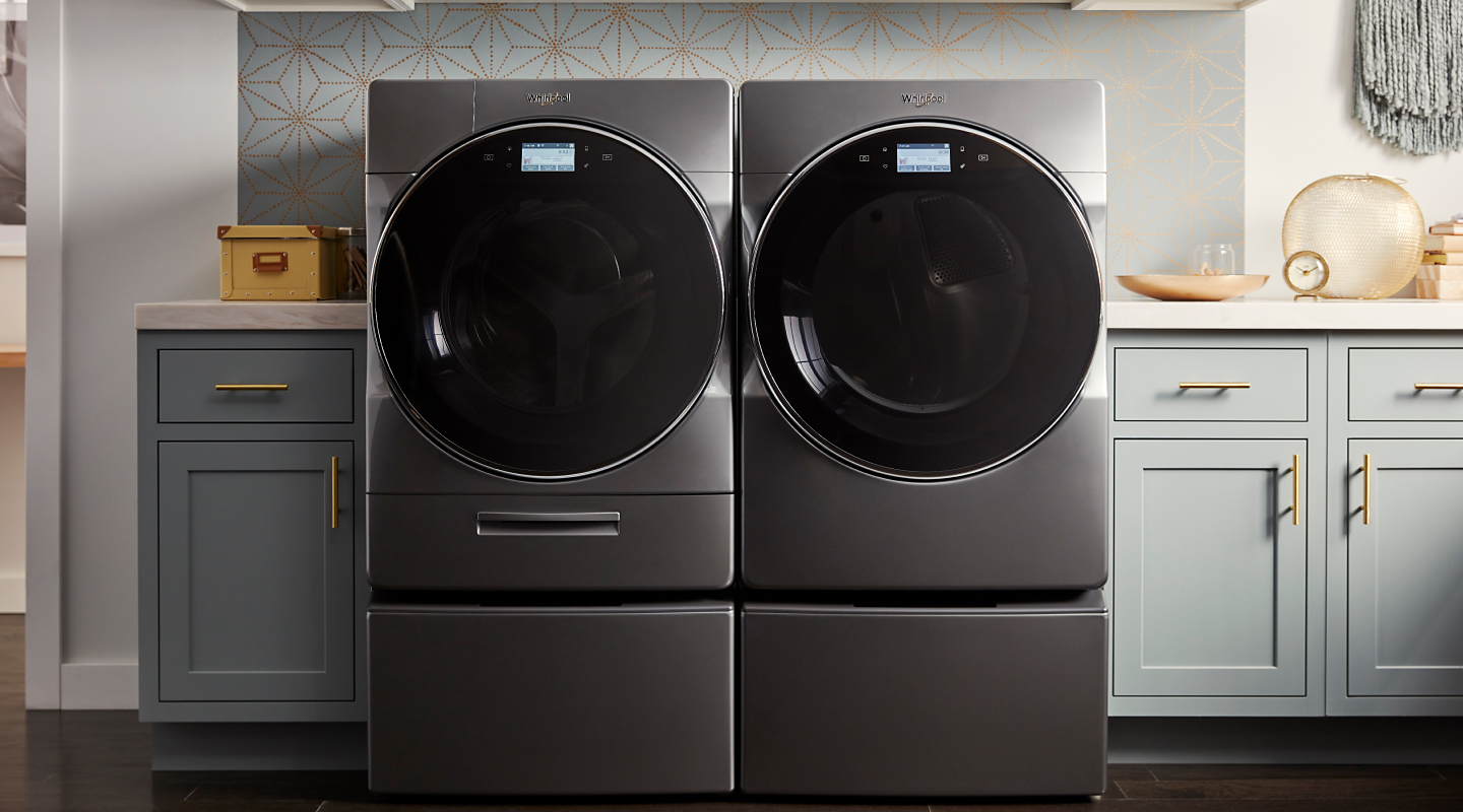 Whirlpool® washer and dryer set in a house