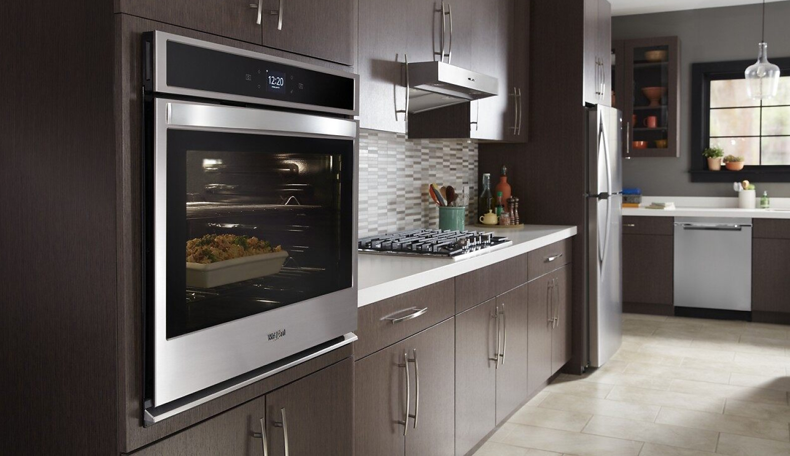 Kitchen showcasing Whirlpool® wall oven and appliances