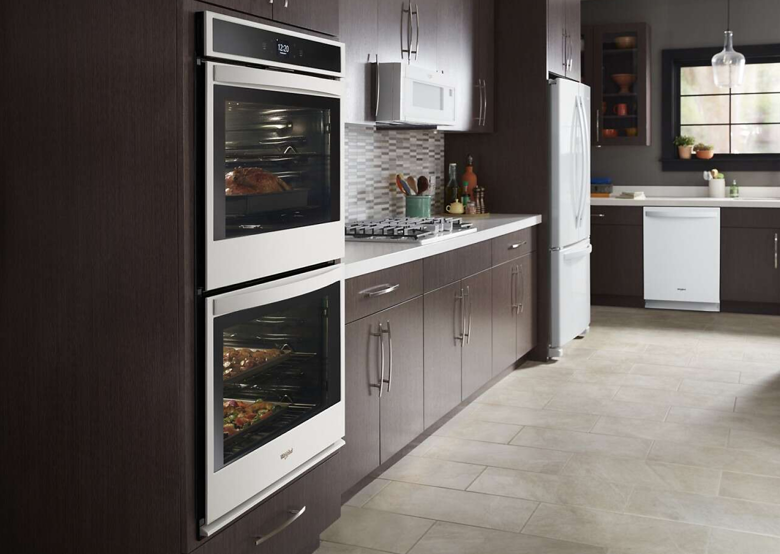 Kitchen showcasing Whirlpool® double wall oven and appliances