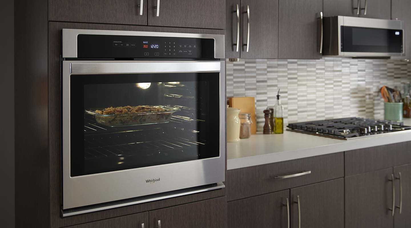 Whirlpool®  single wall oven in a modern kitchen