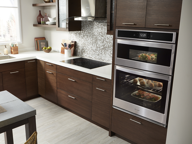Whirlpool®  wall oven microwave combo in a modern kitchen
