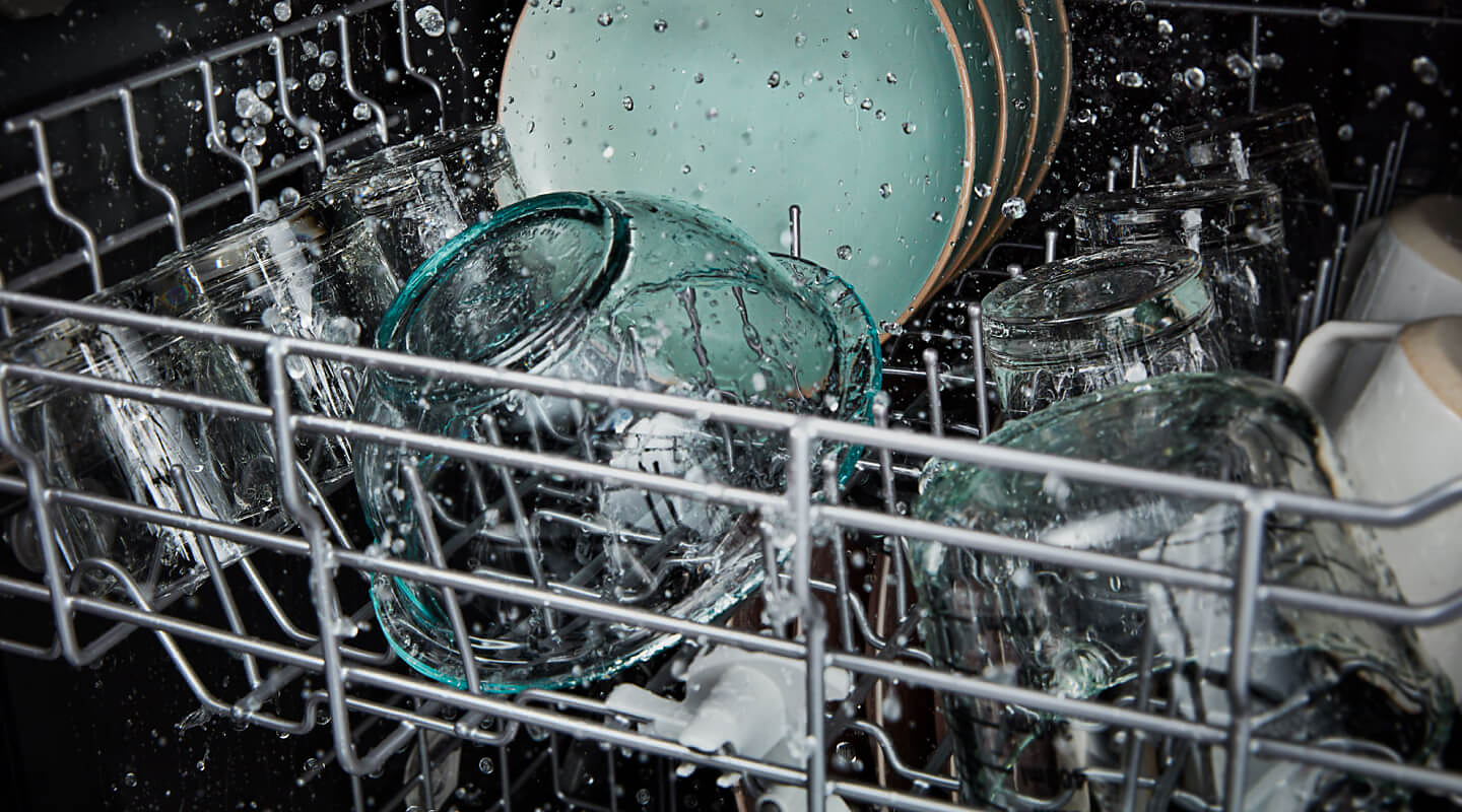 Glass bowl being washed in dishwasher