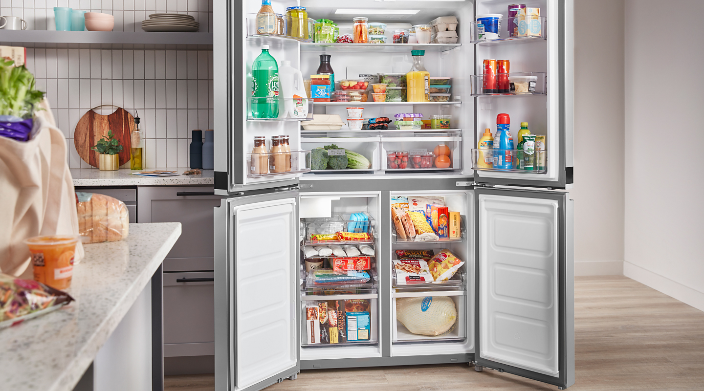4-door refrigerator open to reveal contents