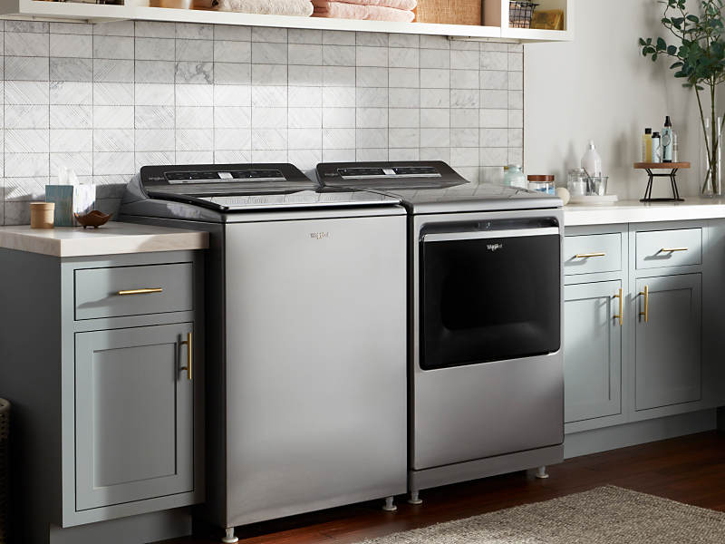 A washer and dryer set in a laundry room