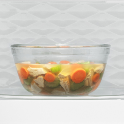 Sliced vegetables inside a glass bowl