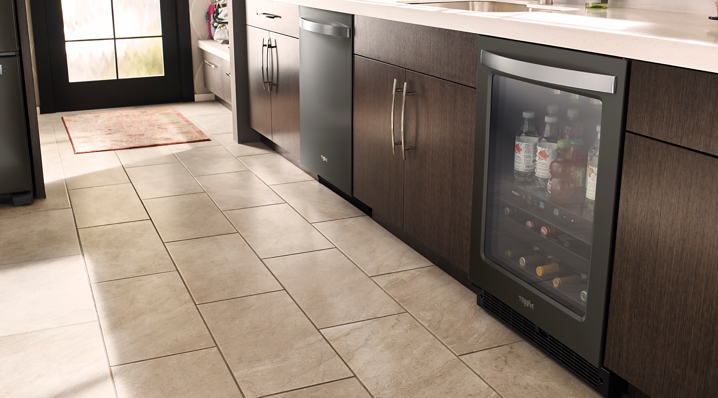 Whirlpool® dishwasher and beverage center in a kitchen