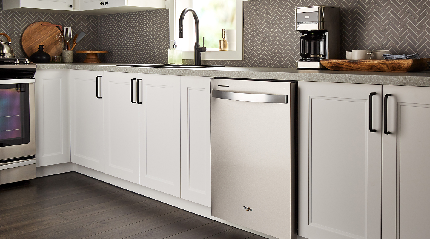 A Whirlpool® dishwasher in a kitchen.