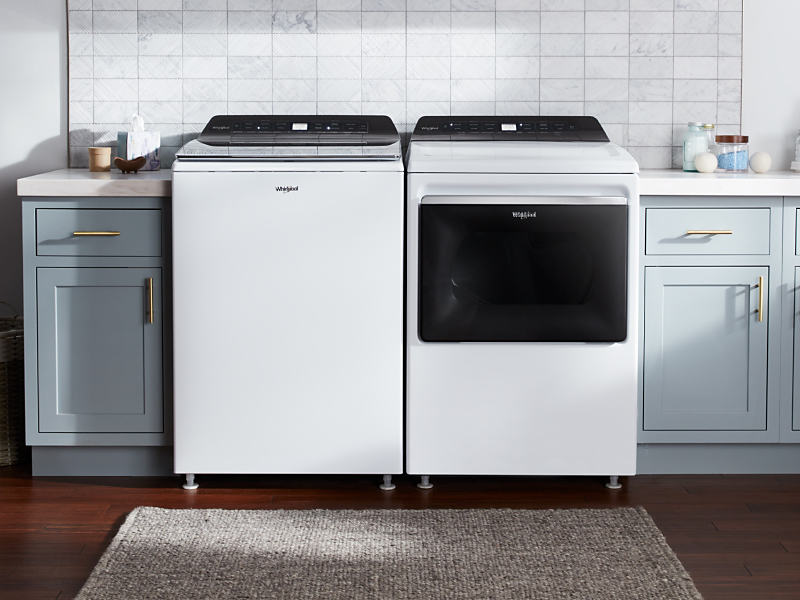 White Whirlpool® top loading washer and dryer
