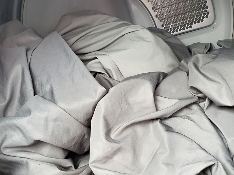 Interior of Whirlpool® dryer with sheets Interior of Whirlpool® dryer with sheets