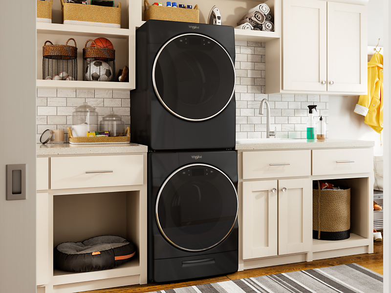 Stacked black Whirlpool® washer and dryer