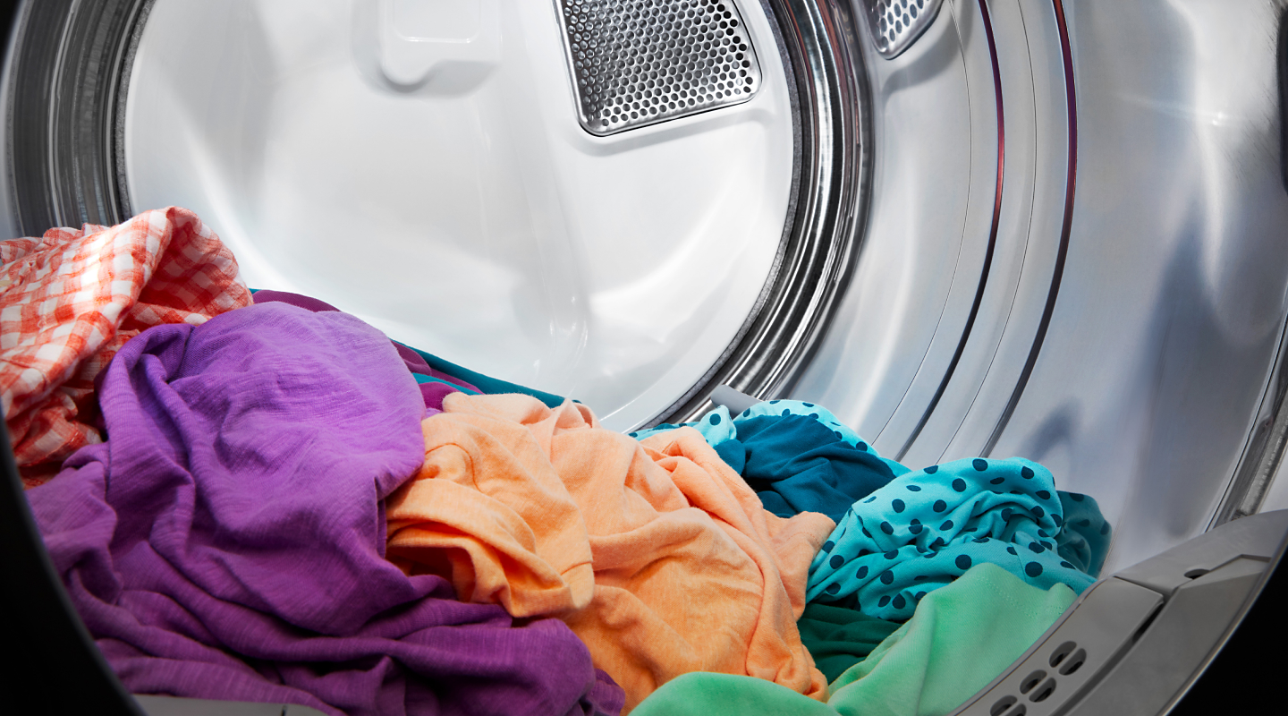 Dry clothes in a dryer drum