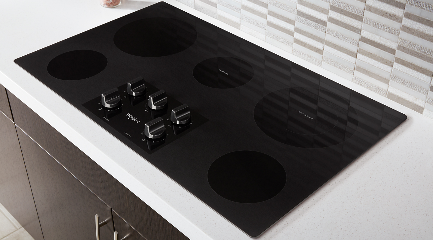 5-burner electric cooktop on a white counter