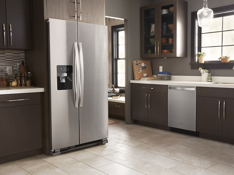 Modern kitchen with stainless steel side-by-side refrigerator