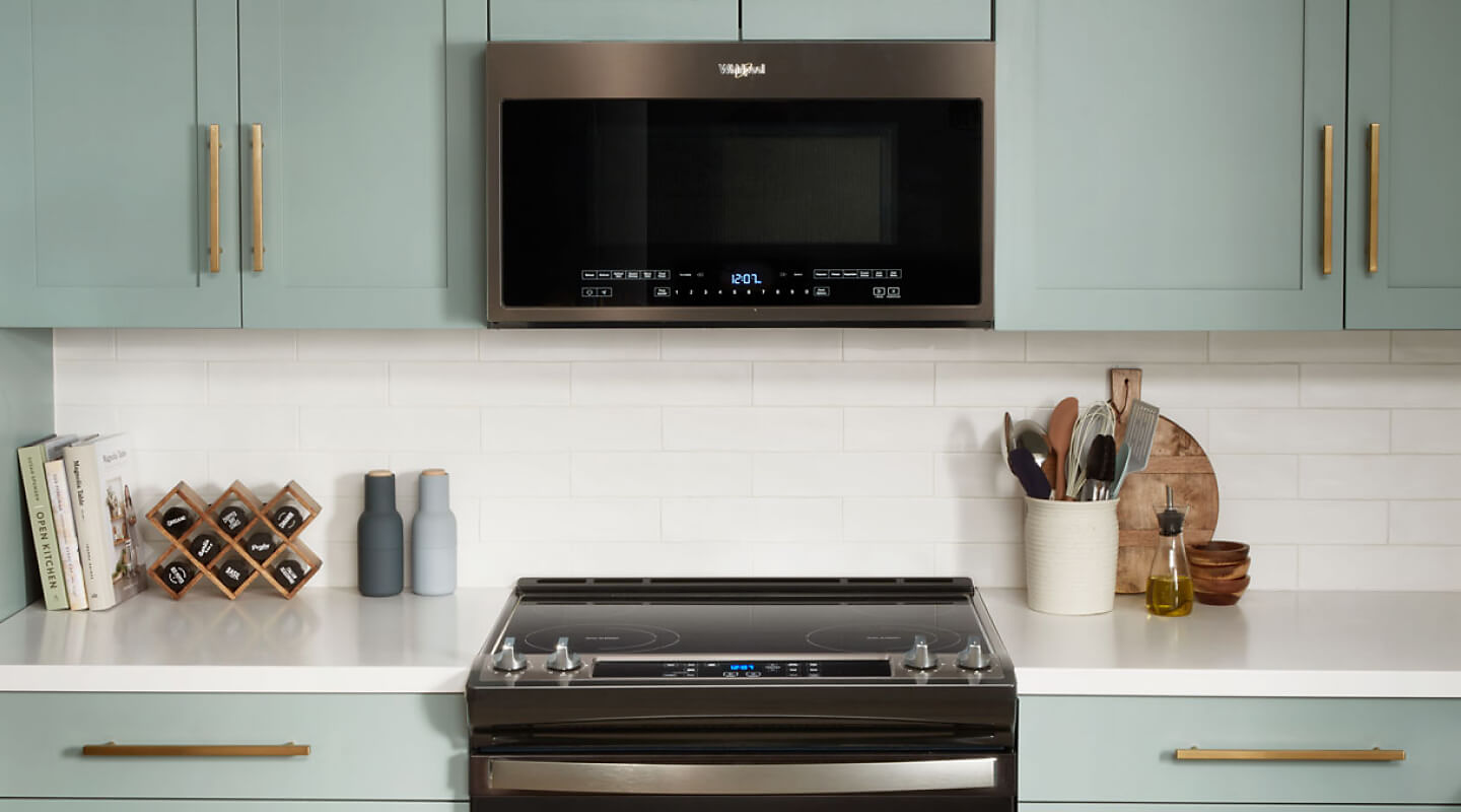 Whirlpool® over-the-range microwave installed above a Whirlpool® electric range