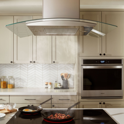 Canopy vent hood over a island cooktop