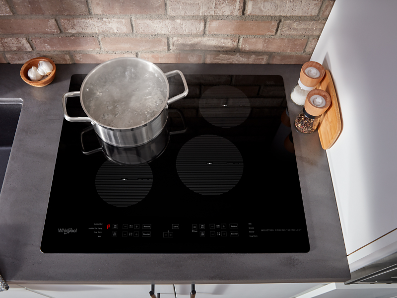 Pot of boiling water on an induction cooktop