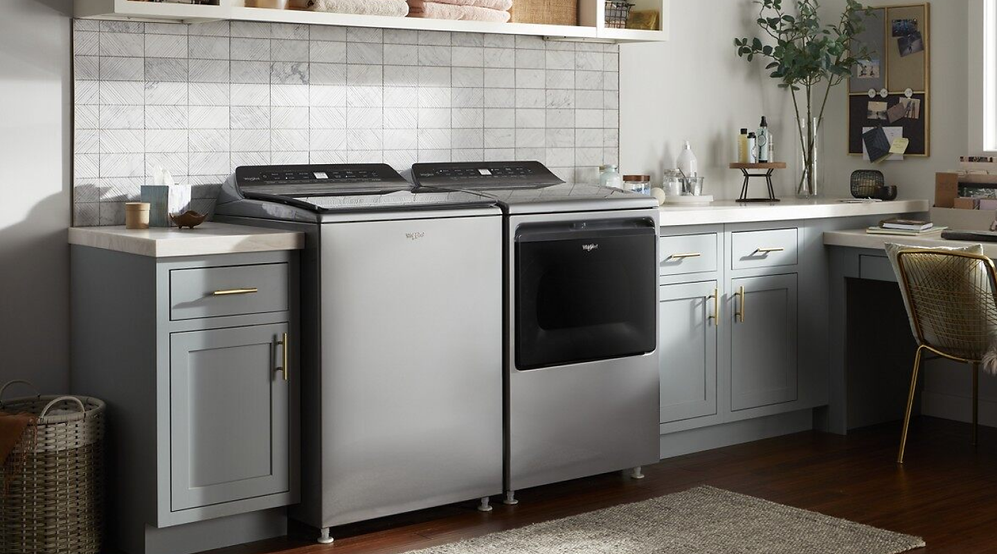Kitchen with Whirlpool®  4.8 cu. ft. Top Load Washer with Pretreat Station and 7.4 cu. ft. Top Load Electric Dryer with Intuitive Controls