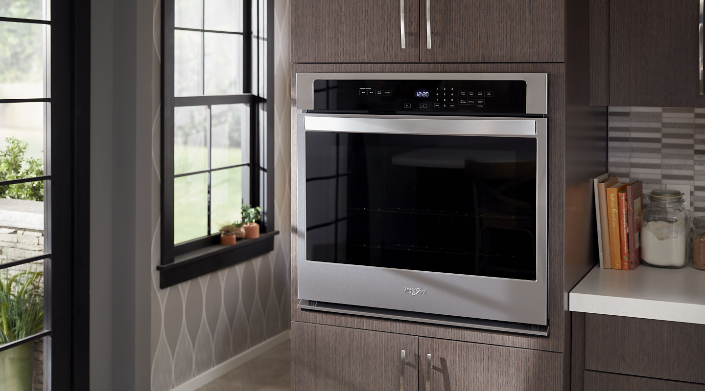 A Whirlpool® wall oven in a modern kitchen.