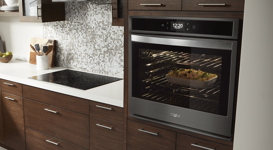 A smart oven with a dish cooking inside of it