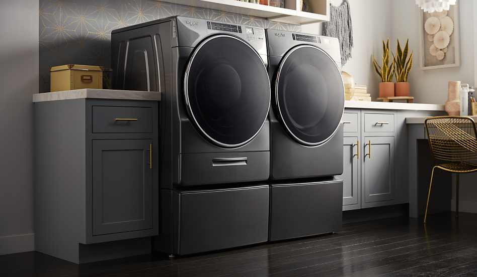 A washer and dryer set in a laundry room