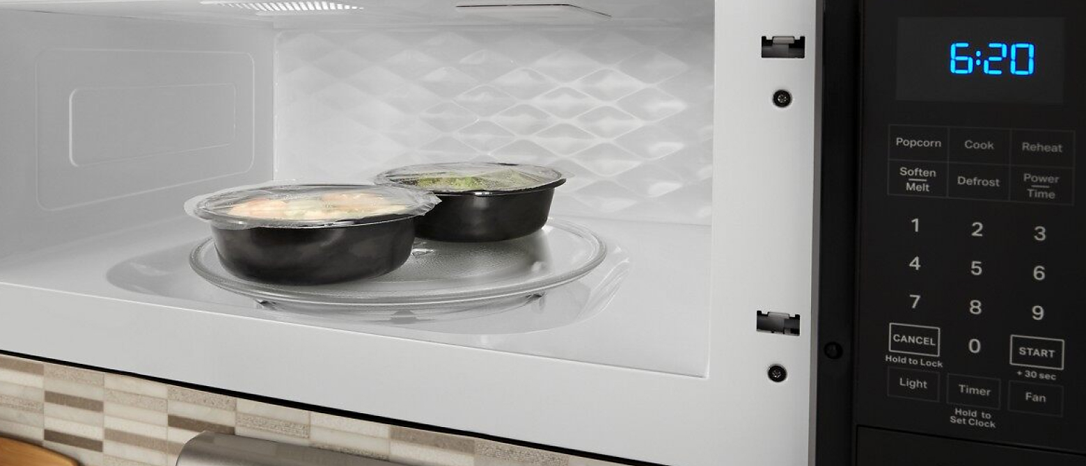 Frozen dinners inside a microwave