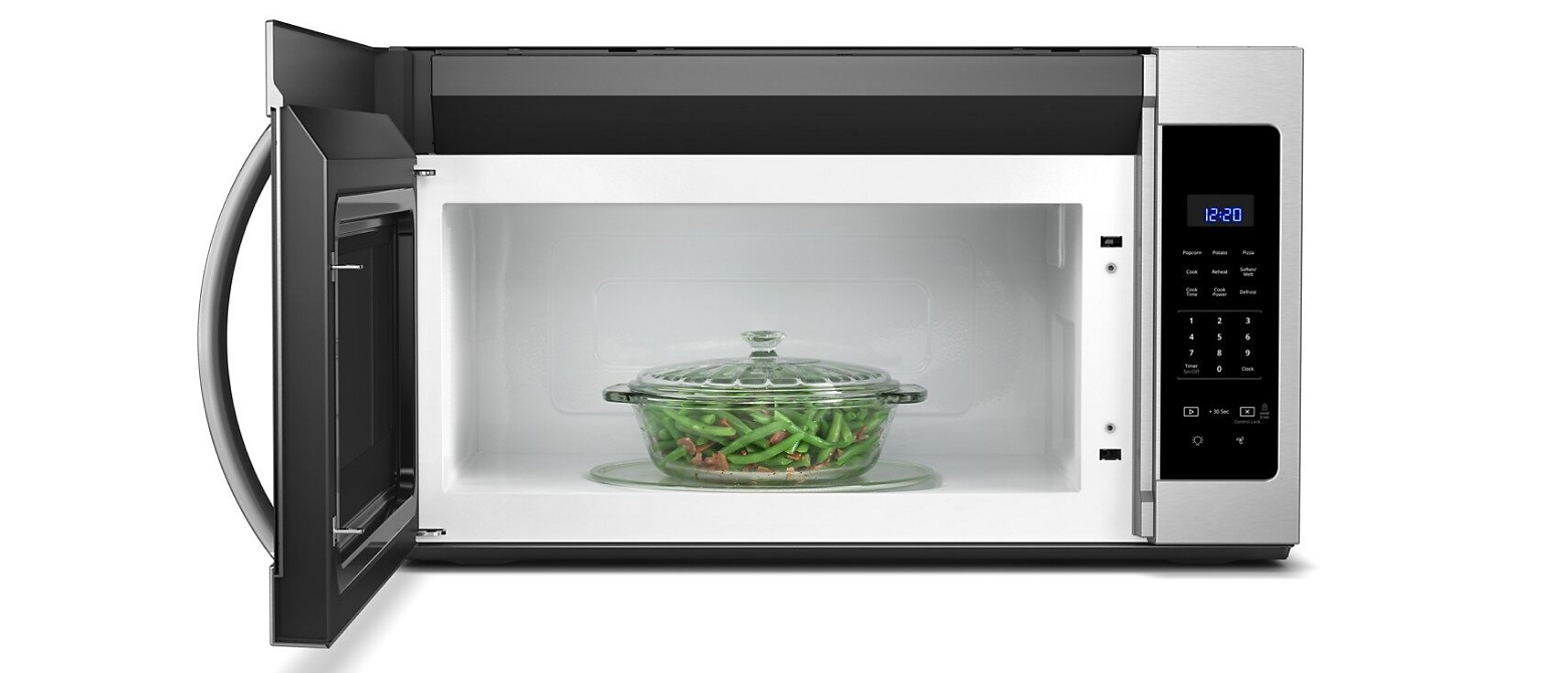 Vegetables in a dish inside a microwave