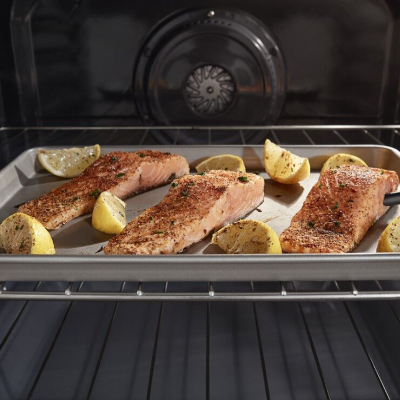 Salmon with lemon roasting in a convection oven
