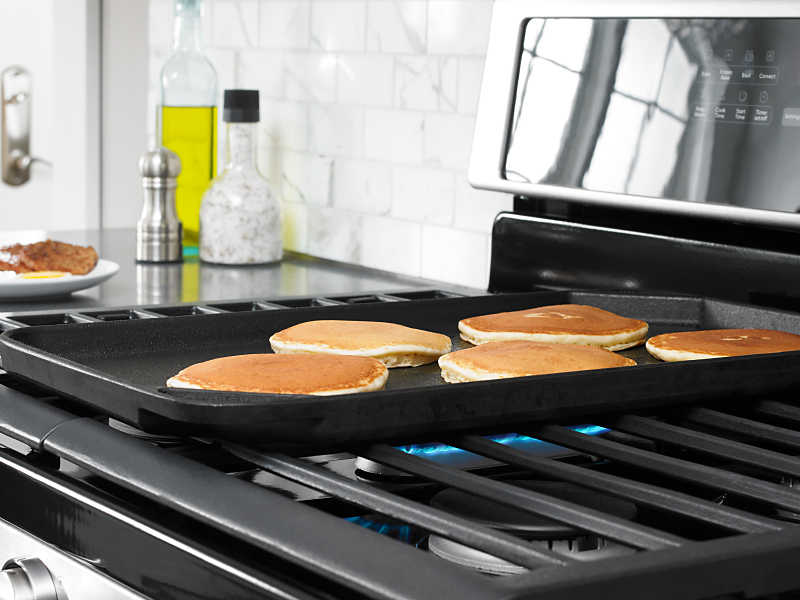Pancakes cooking on a Whirlpool® gas range
