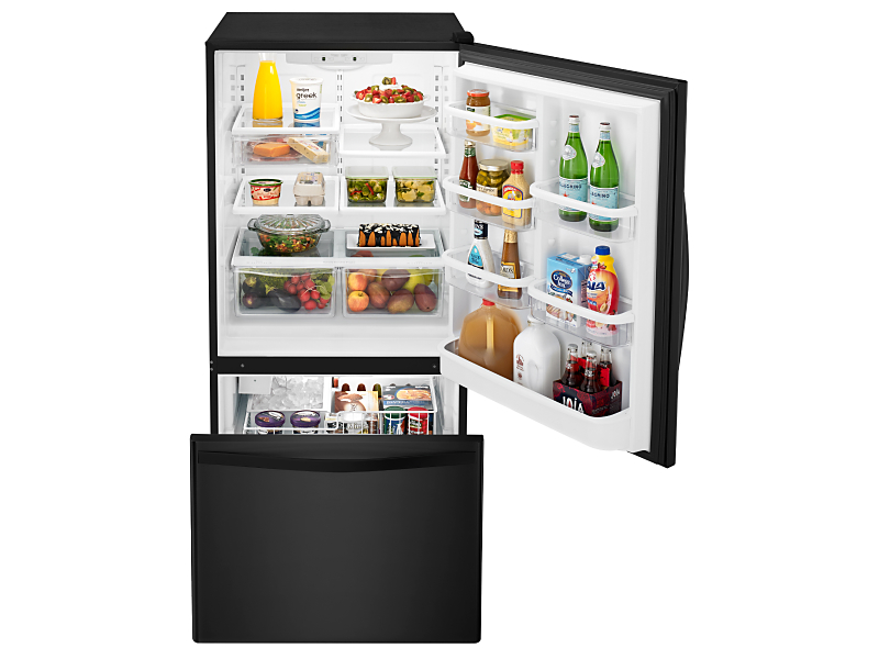 Open bottom-freezer refrigerator with food inside