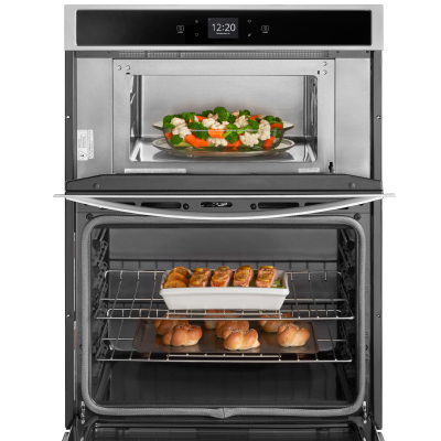 Various dishes cooking in a microwave-combination wall oven