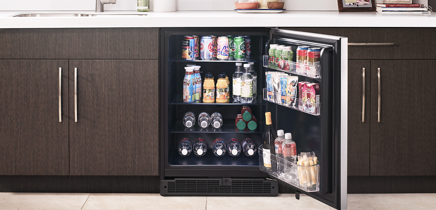 Whirlpool® beverage center filled with cans and bottles