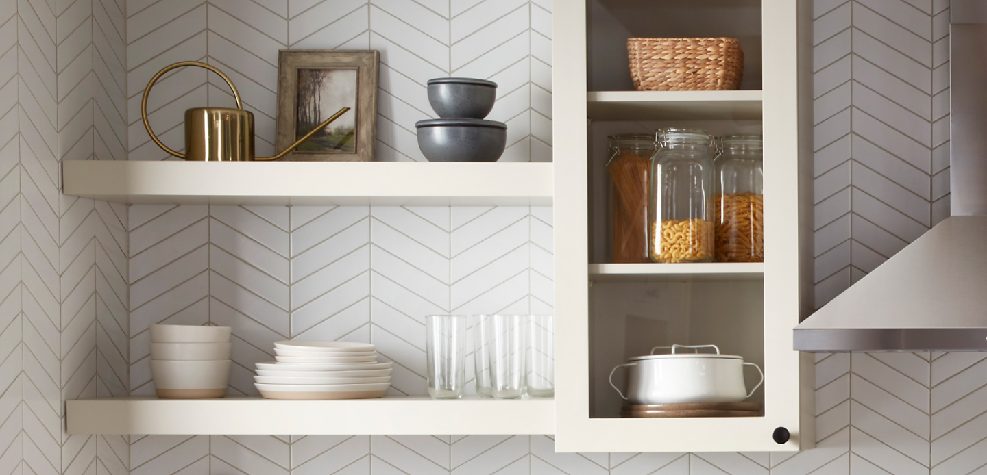 White shelves filled with dishes and glassware