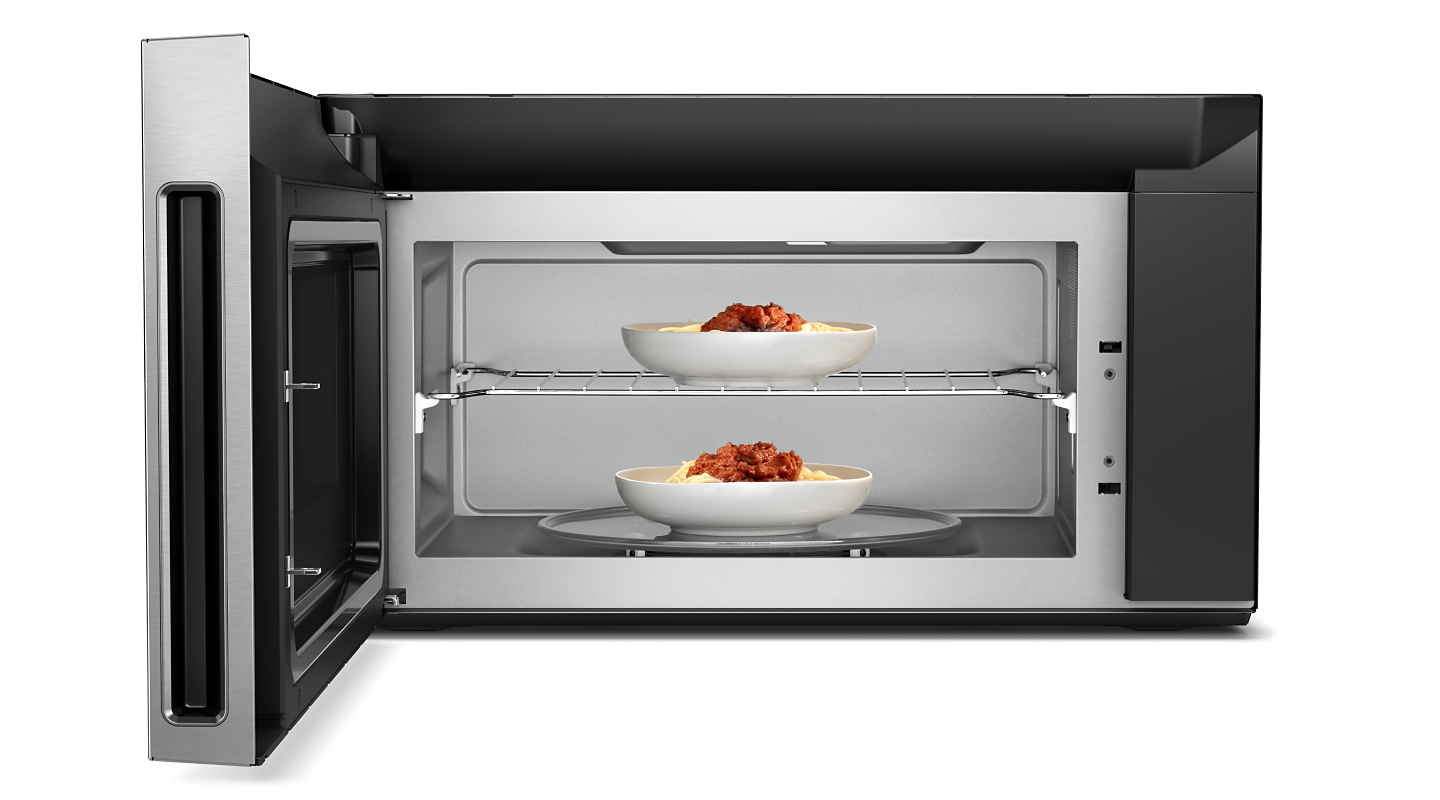 Open convection microwave with dishes on and below convection rack