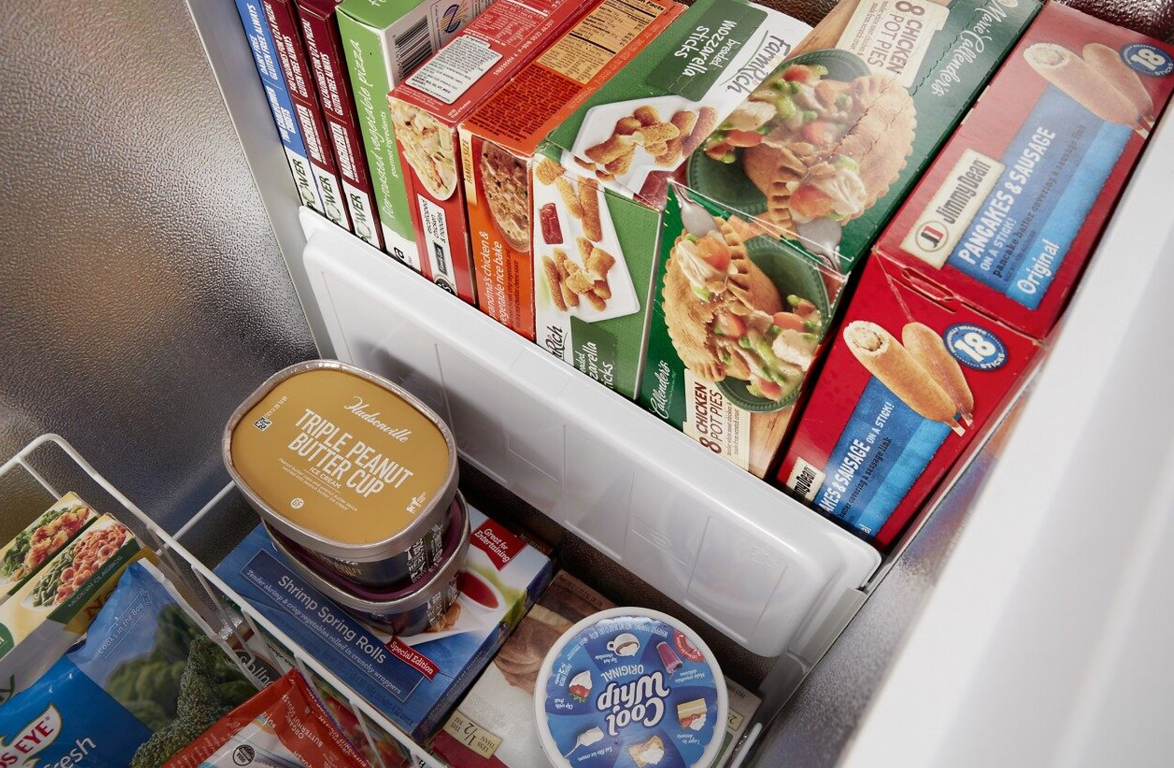 Close up view of food organized in a Whirlpool® deep freezer