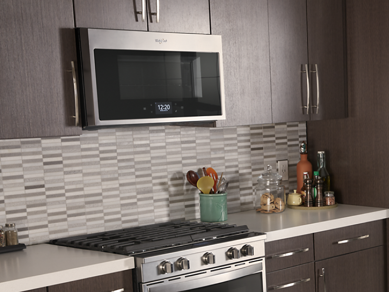 Stainless steel Whirlpool® appliances in a modern kitchen