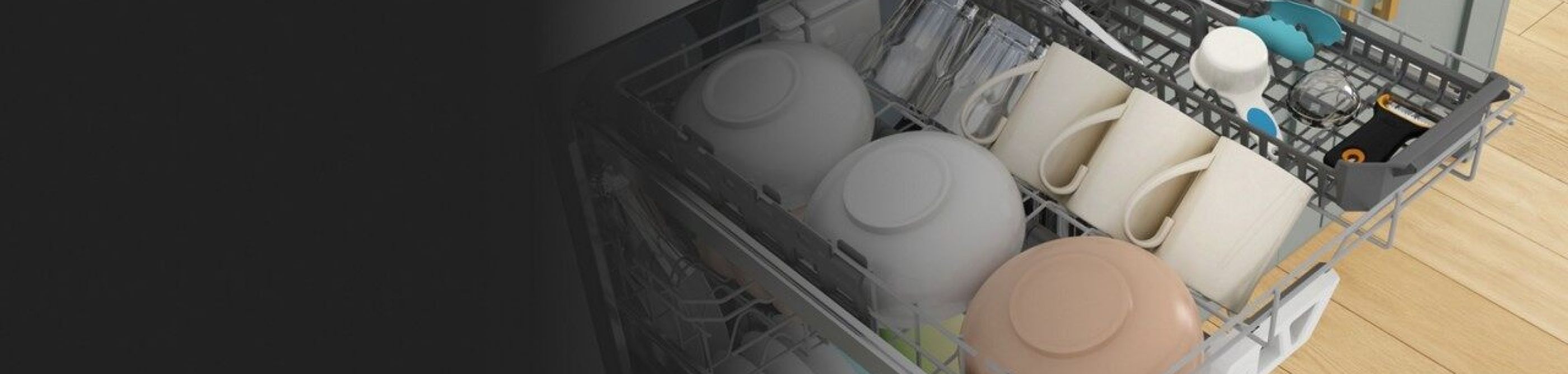 Bowls, mugs and utensils loaded in the 3rd rack of a dishwasher