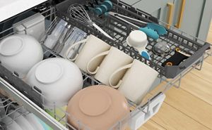 Bowls, mugs and utensils loaded in the 3rd rack of a dishwasher