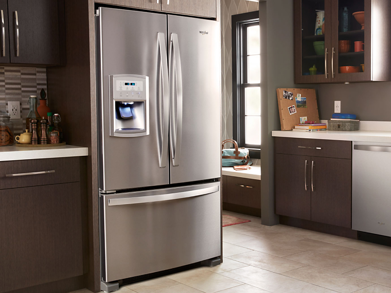 A stainless steel French door refrigerator with bottom freezer