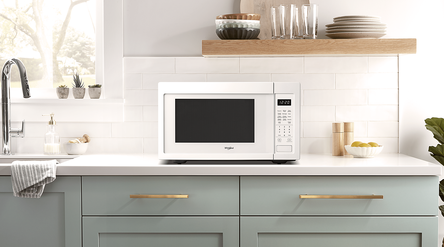 A Whirlpool® Countertop Microwave in a modern kitchen. 