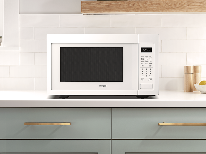 A Whirlpool® Countertop Microwave in a modern kitchen. 