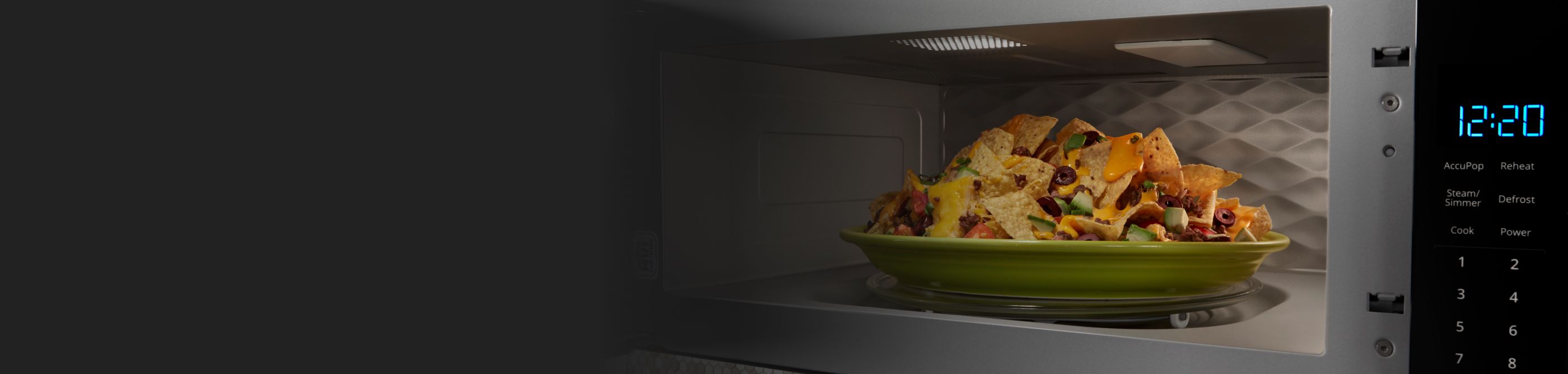 A plate of nachos in the microwave