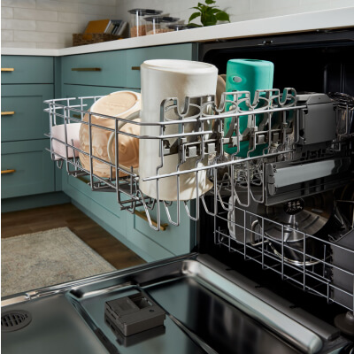 Cups and mugs in a dishwasher top rack