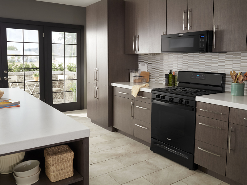 A full kitchen featuring a Whirlpool® oven