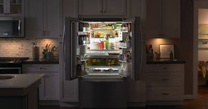Open Whirlpool® Refrigerator in a kitchen
