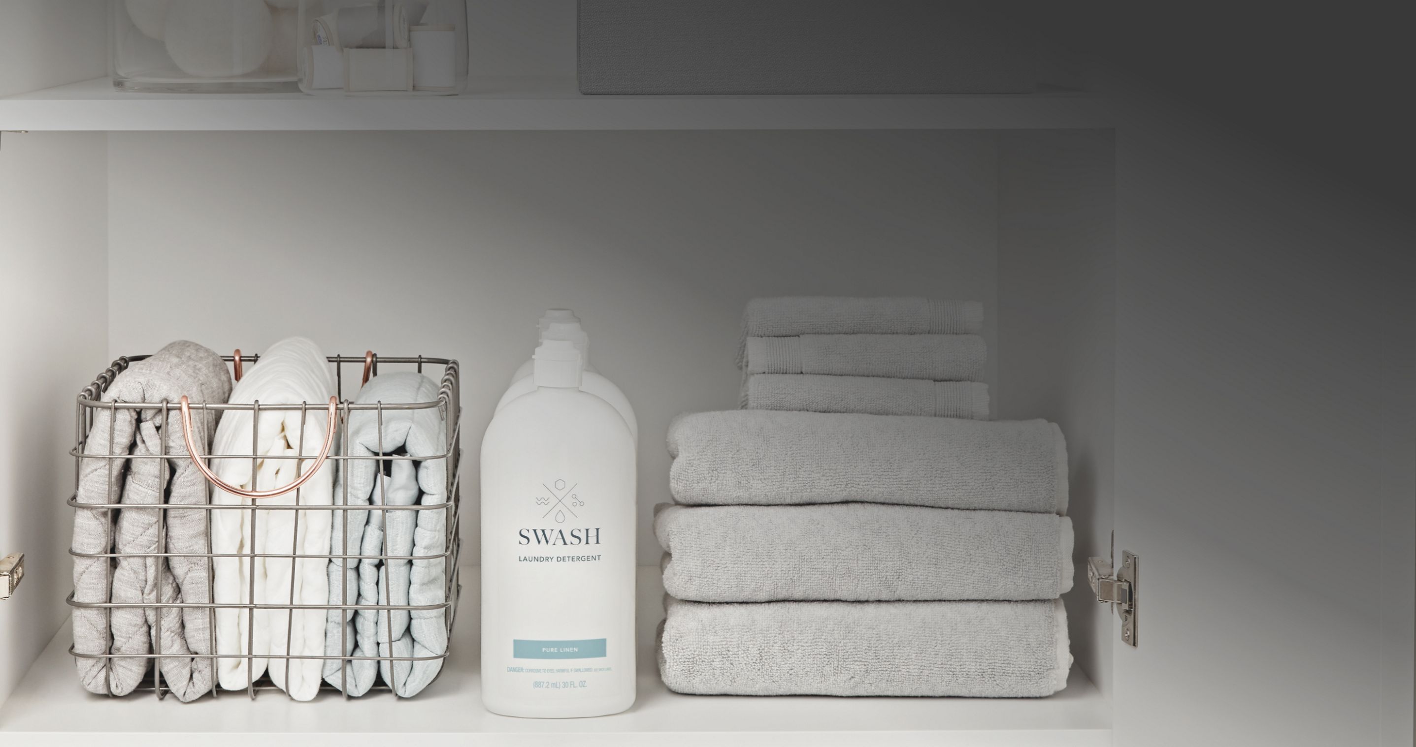 Towels and Swash® Laundry Detergent.